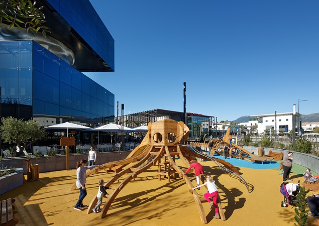 Kids play at a playground in Polygone Riveria.